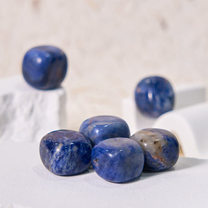 Pierre précieuse naturelle roulée en sodalite bleue Olivenorma