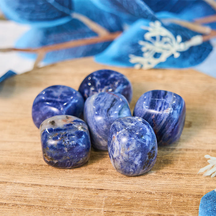 Pierre précieuse naturelle roulée en sodalite bleue Olivenorma