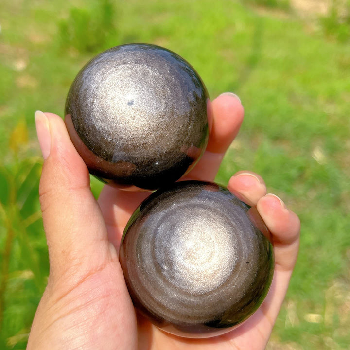 Sphère de cristal d'obsidienne argentée naturelle Olivenorma