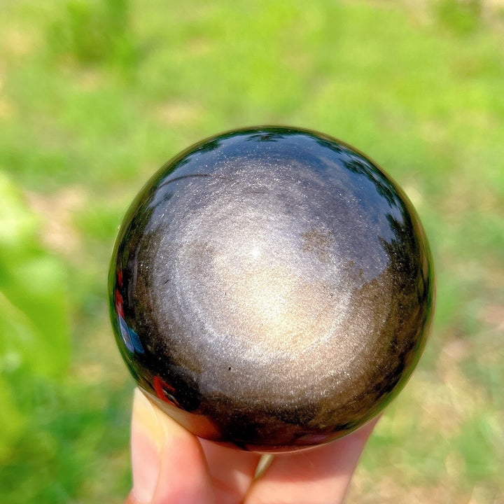 Sphère de cristal d'obsidienne argentée naturelle Olivenorma