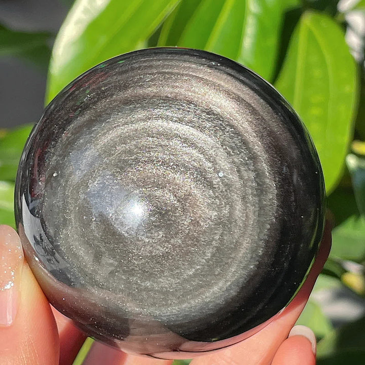 Sphère de cristal d'obsidienne argentée naturelle Olivenorma