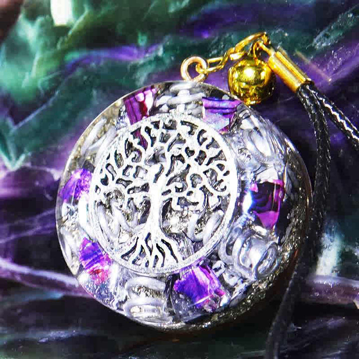 Collier d'orgone en hématite cristal clair et charoïte naturelle d'Olivenorma
