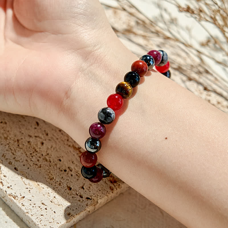 Bracelet de perles en obsidienne flocon de neige, hématite, rubis et quartz Olivenorma