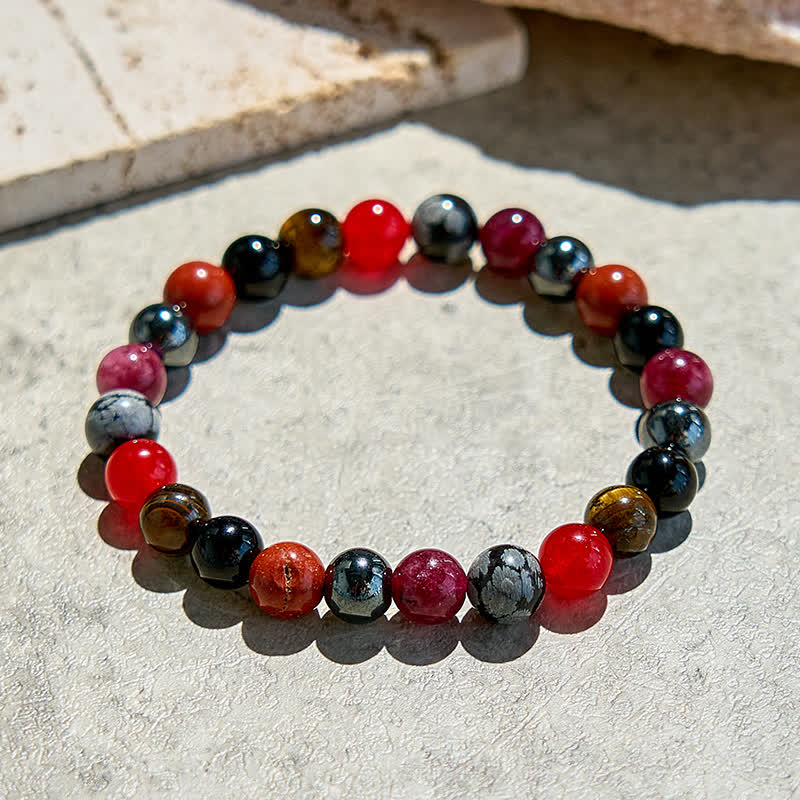 Bracelet de perles en obsidienne flocon de neige, hématite, rubis et quartz Olivenorma