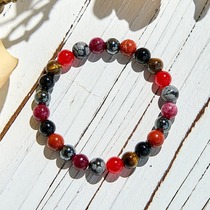 Bracelet de perles en obsidienne flocon de neige, hématite, rubis et quartz Olivenorma