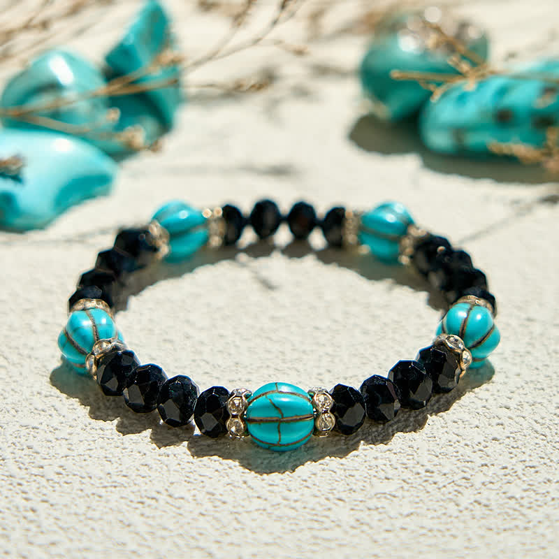 Bracelet en perles d'obsidienne turquoise en forme de citrouille Olivenorma