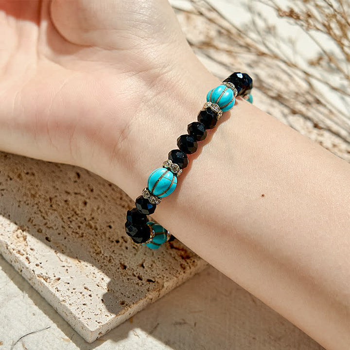 Bracelet en perles d'obsidienne turquoise en forme de citrouille Olivenorma