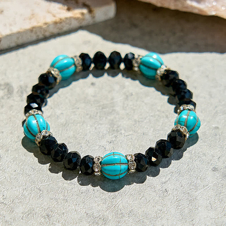 Bracelet en perles d'obsidienne turquoise en forme de citrouille Olivenorma
