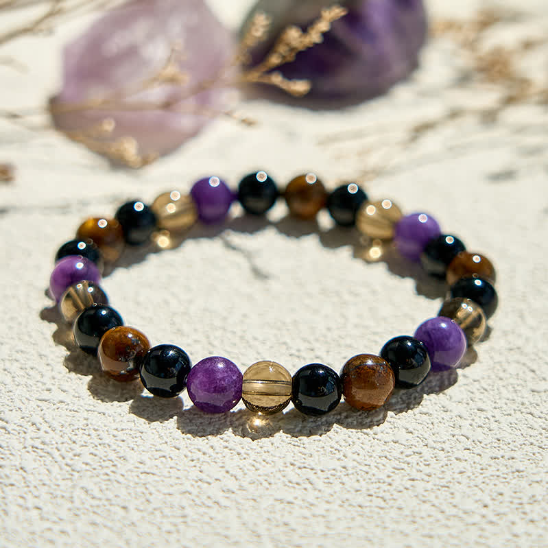 Bracelet de perles en obsidienne et œil de tigre et charoïte Olivenorma