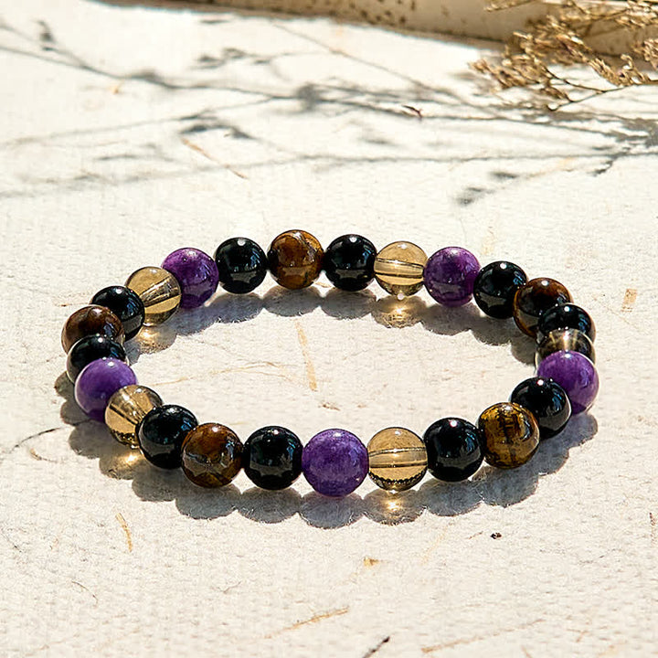 Bracelet de perles en obsidienne et œil de tigre et charoïte Olivenorma