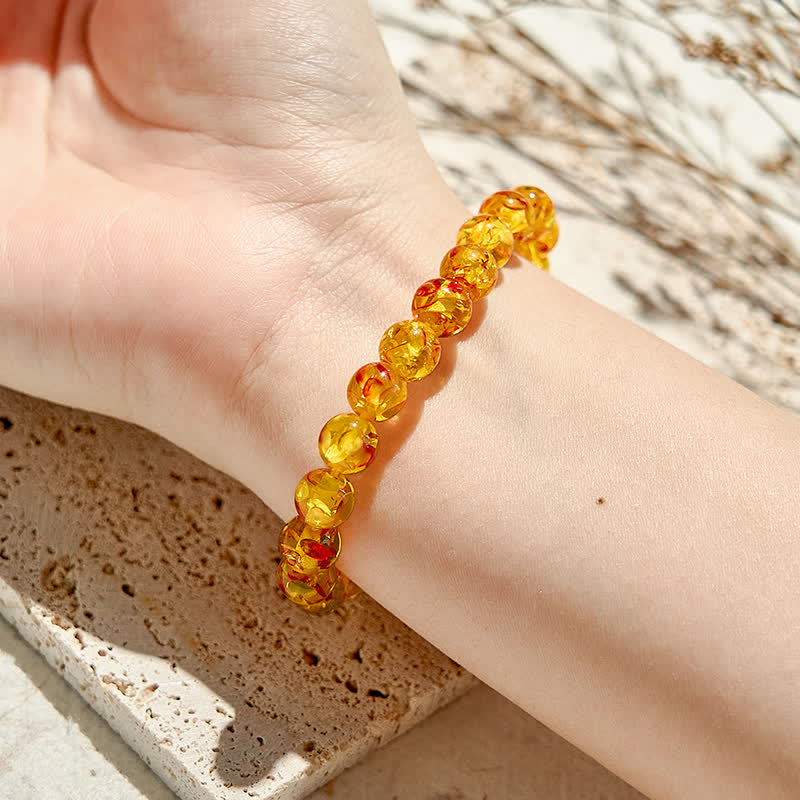 Bracelet de perles d'ambre artificielles Olivenorma