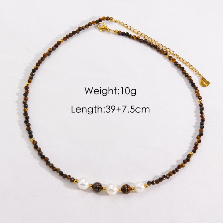Collier de perles en obsidienne et œil de tigre en calcédoine blanche Olivenorma