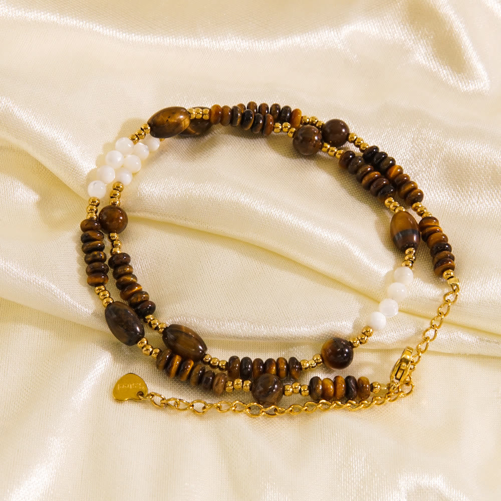 Collier de perles en obsidienne et œil de tigre en calcédoine blanche Olivenorma