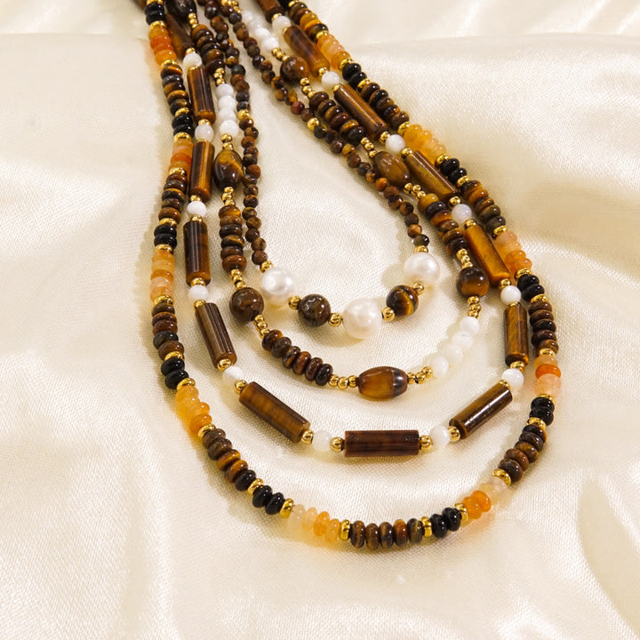 Collier de perles en obsidienne et œil de tigre en calcédoine blanche Olivenorma