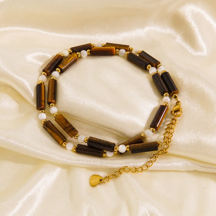 Collier de perles en obsidienne et œil de tigre en calcédoine blanche Olivenorma