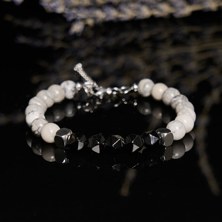 Bracelet de perles en onyx noir et jaspe gris à facettes Olivenorma