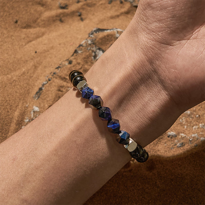 Bracelet en perles d'obsidienne œil de tigre bleu à facettes Olivenorma