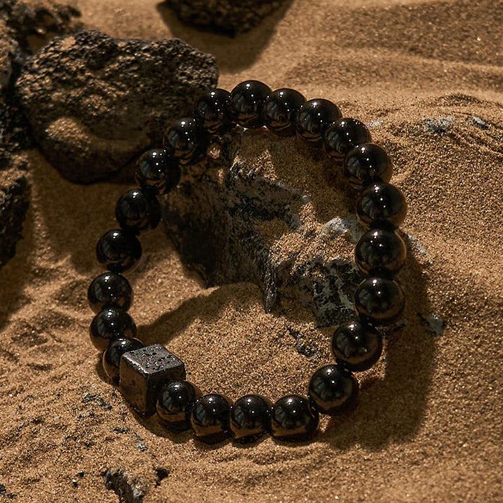 Bracelet en perles d'obsidienne en pierre de lave taillée en cube Olivenorma