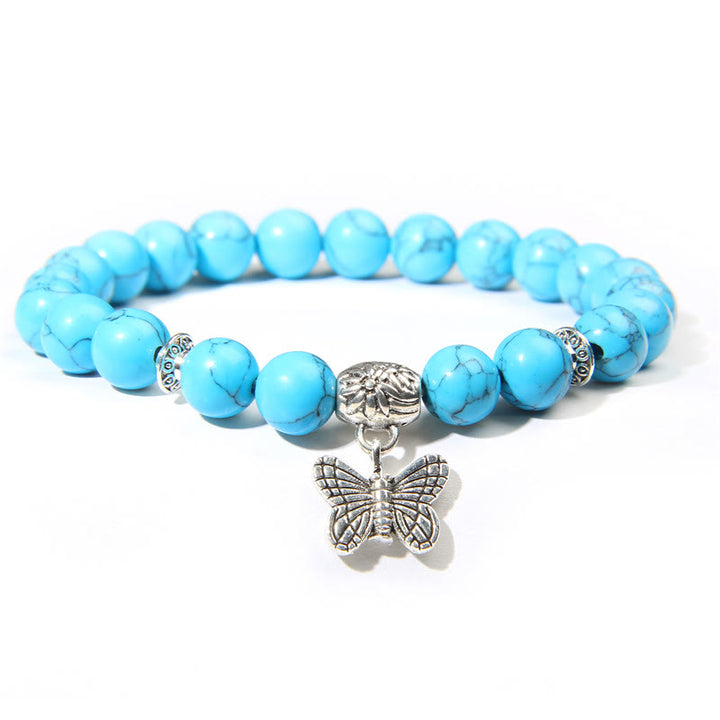 Bracelet à breloques papillon en turquoise naturelle Olivenorma