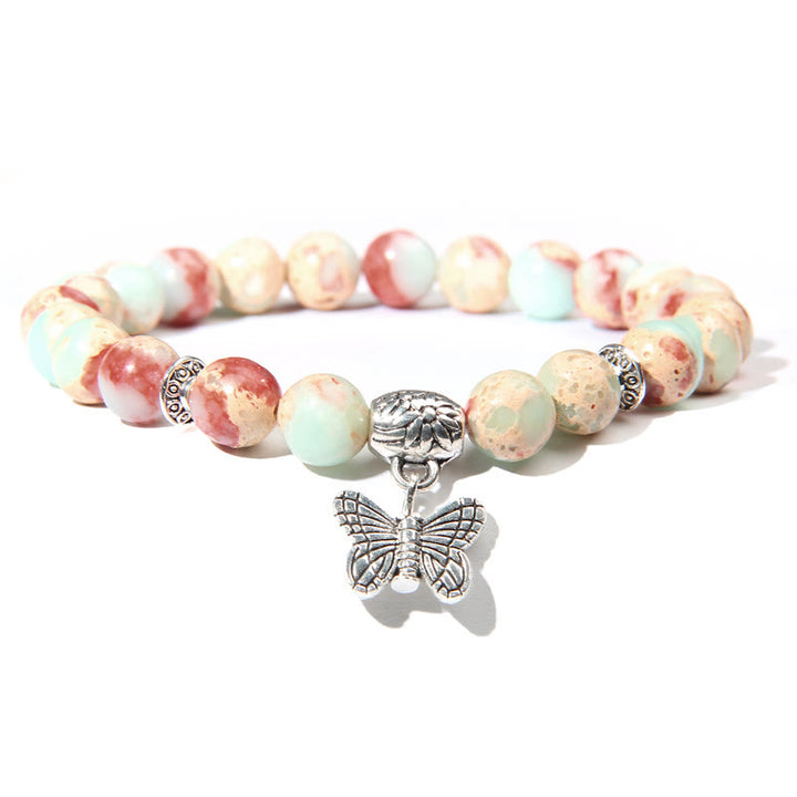 Bracelet à breloques papillon en turquoise naturelle Olivenorma