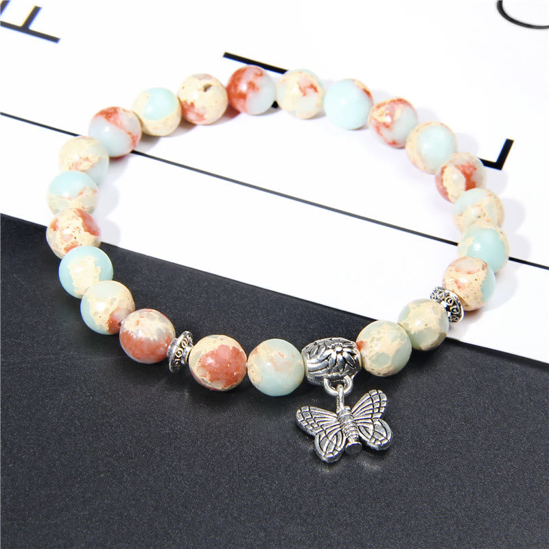 Bracelet à breloques papillon en turquoise naturelle Olivenorma