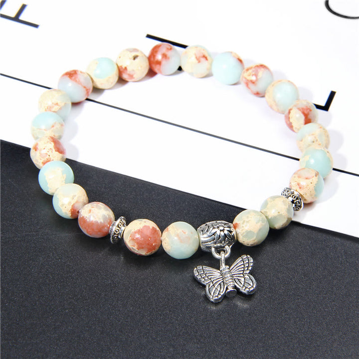 Bracelet à breloques papillon en turquoise naturelle Olivenorma