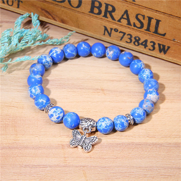 Bracelet à breloques papillon en turquoise naturelle Olivenorma