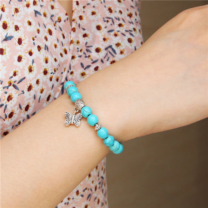 Bracelet à breloques papillon en turquoise naturelle Olivenorma
