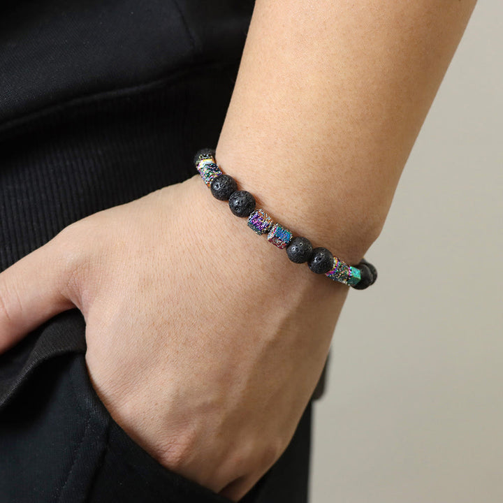 Bracelet en perles de pierre de lave géométriques pailletées Olivenorma