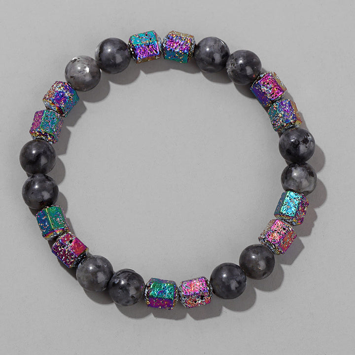 Bracelet en perles de pierre de lave géométriques pailletées Olivenorma