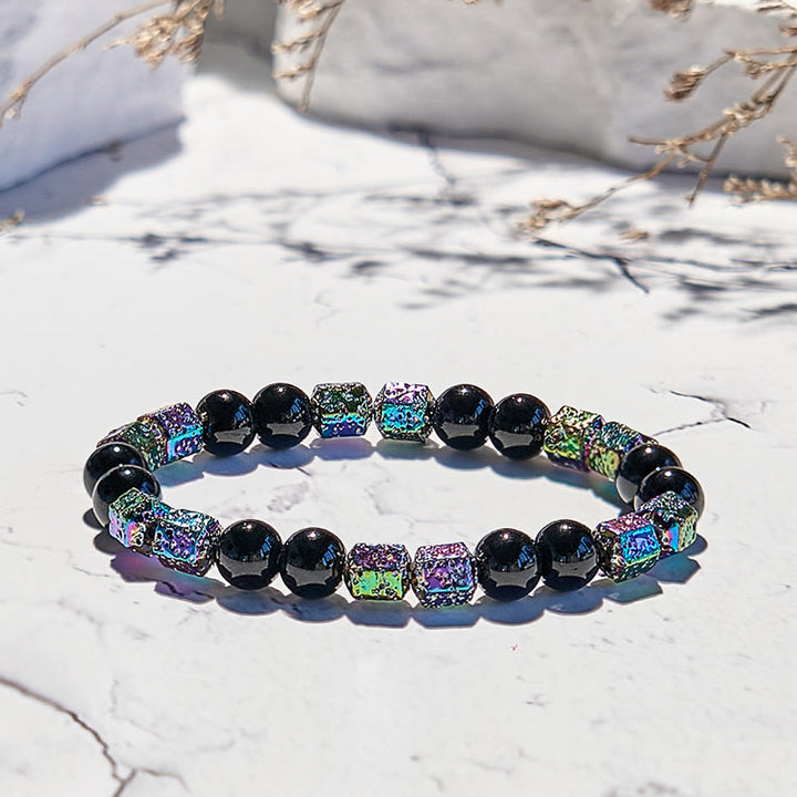 Bracelet en perles d'onyx noir et pierre de lave hématite électrolytique Olivenorma