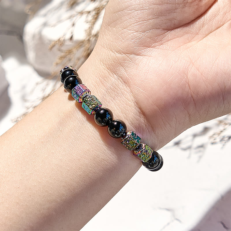 Bracelet en perles d'onyx noir et pierre de lave hématite électrolytique Olivenorma