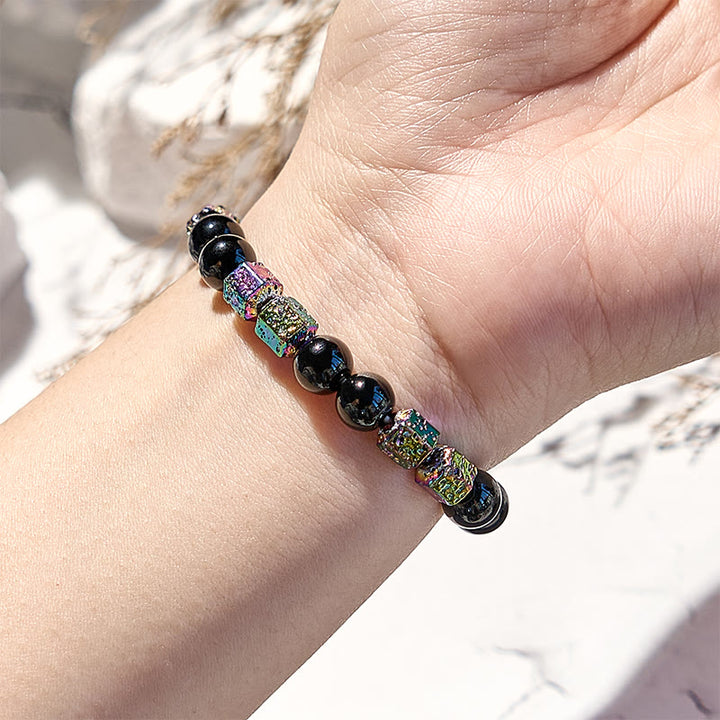 Bracelet en perles d'onyx noir et pierre de lave hématite électrolytique Olivenorma