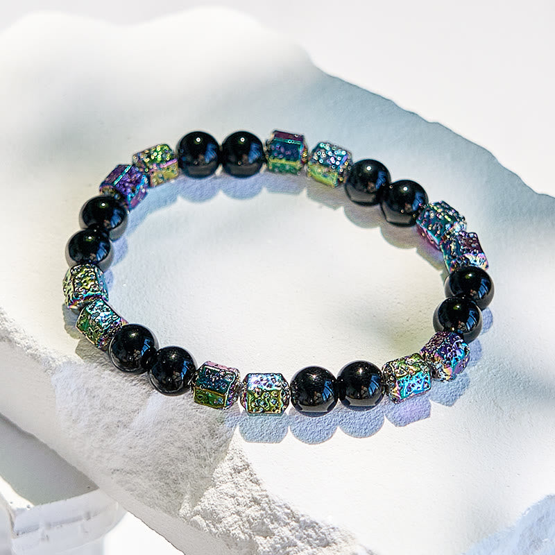 Bracelet en perles d'onyx noir et pierre de lave hématite électrolytique Olivenorma