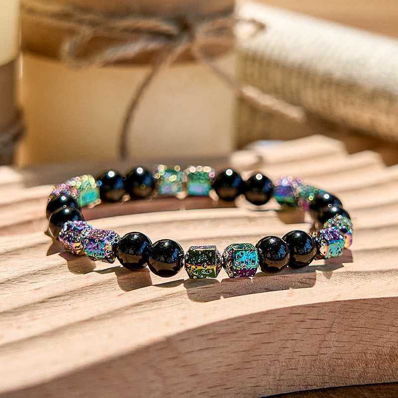 Bracelet en perles d'onyx noir et pierre de lave hématite électrolytique Olivenorma