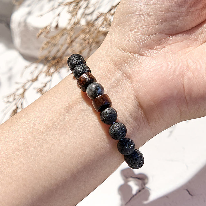 Bracelet en perles de pierre de lave et œil de tigre Olivenorma