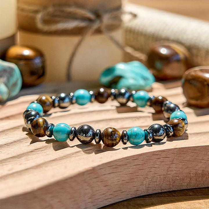 Bracelet de perles en hématite et œil de tigre turquoise Olivenorma