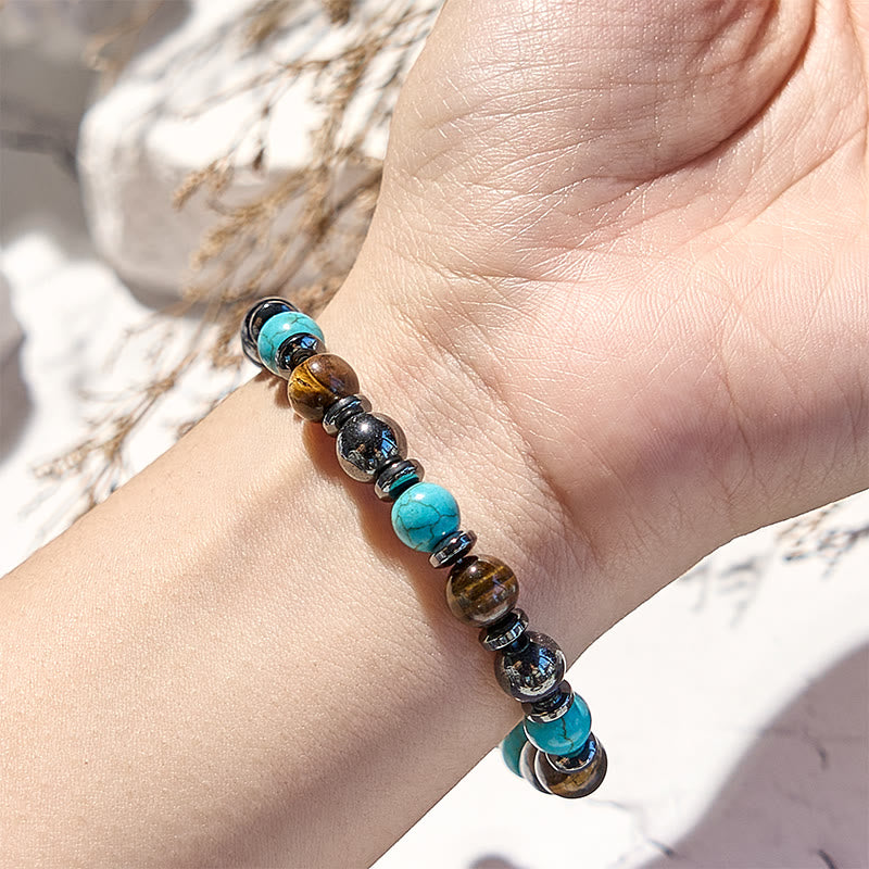 Bracelet de perles en hématite et œil de tigre turquoise Olivenorma
