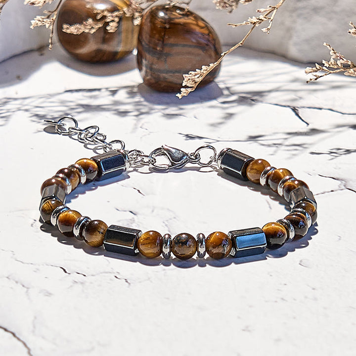 Bracelet en perles d'oeil de tigre en hématite à 6 cylindres Olivenorma