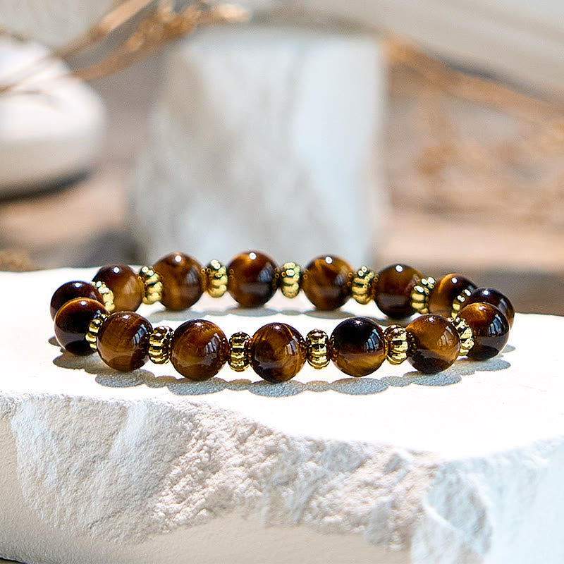 Bracelet en perles en métal doré et œil de tigre naturel Olivenorma