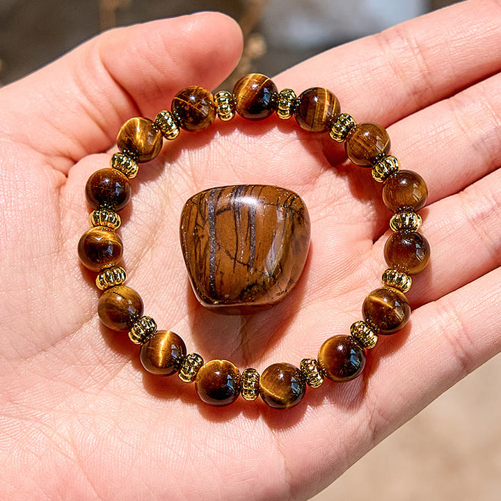 Bracelet en perles en métal doré et œil de tigre naturel Olivenorma