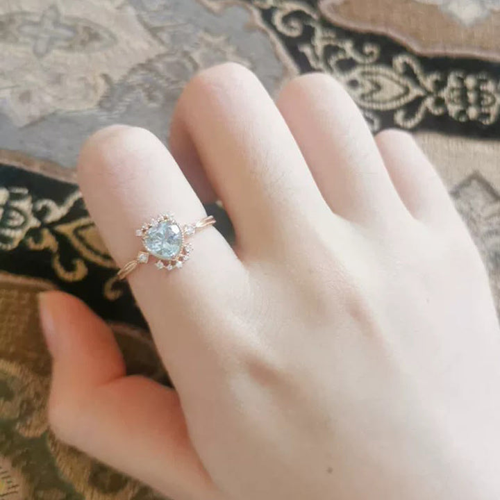 Bague Olivenorma en topaze bleue naturelle et zircon blanc