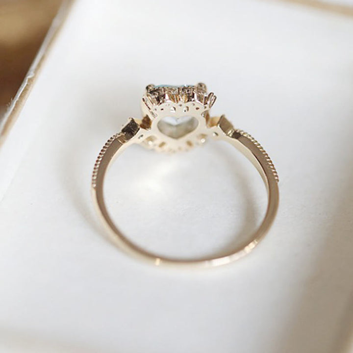 Bague Olivenorma en topaze bleue naturelle et zircon blanc