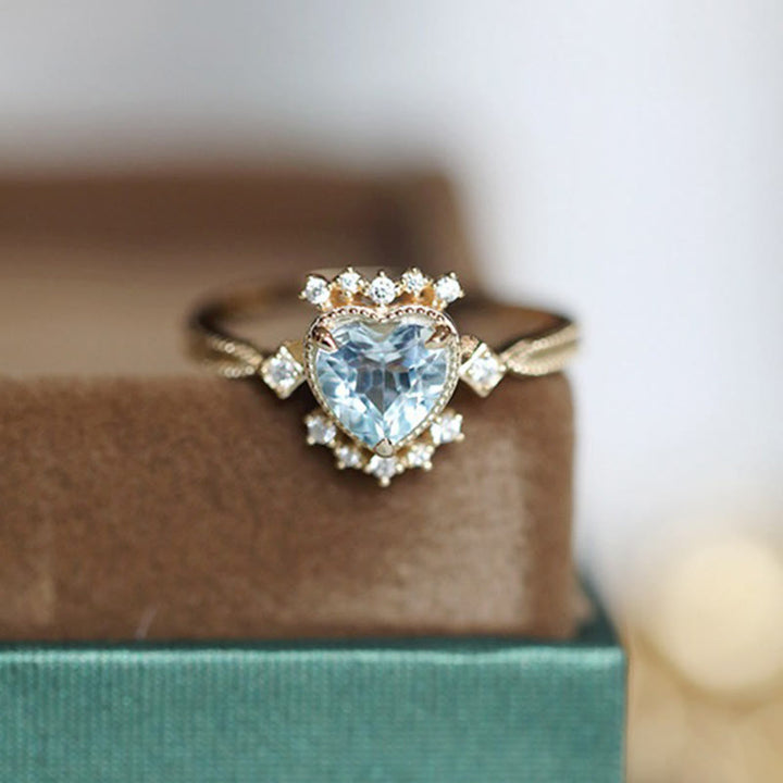 Bague Olivenorma en topaze bleue naturelle et zircon blanc