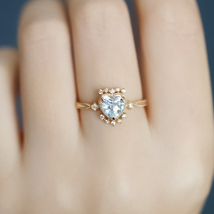 Bague Olivenorma en topaze bleue naturelle et zircon blanc
