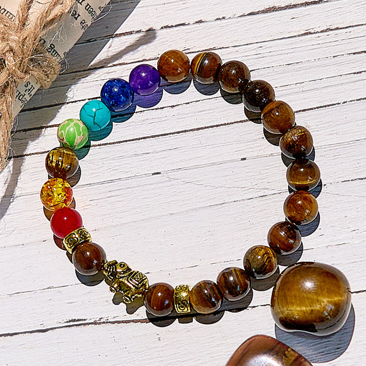 Bracelet de perles avec pendentif éléphant œil de tigre et chakra Olivenorma