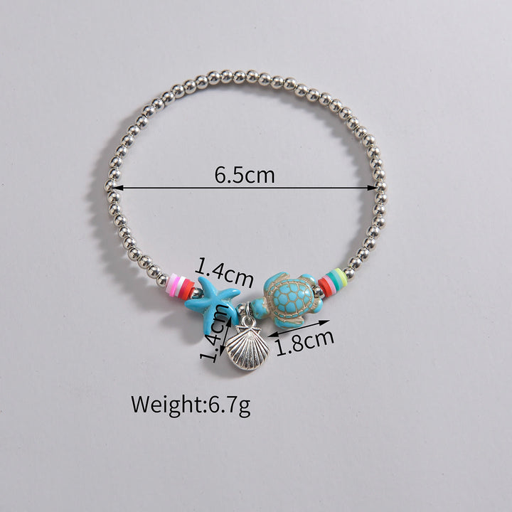 Pendentif de cheville en perles de bois et coquillages en métal turquoise Olivenorma
