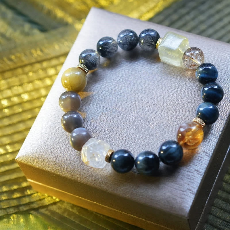 Bracelet en quartz noir rutile et quartz œil de faucon Olivenorma
