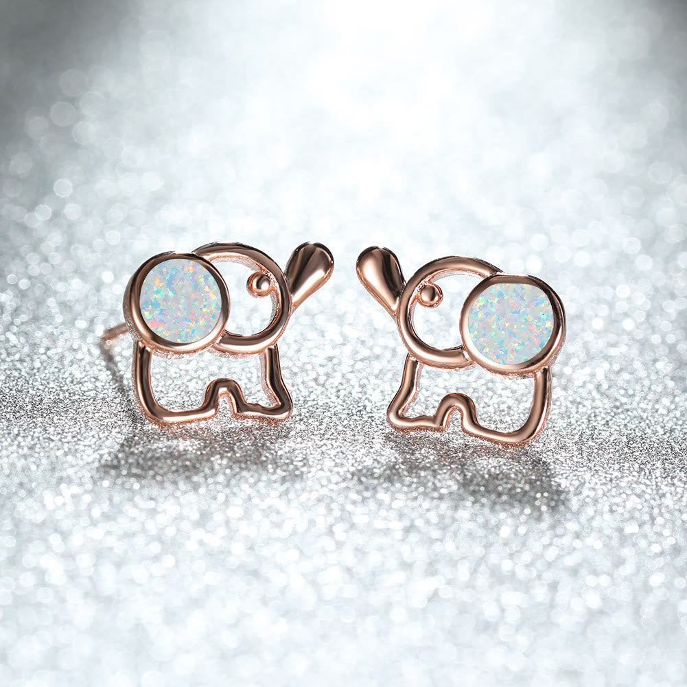 Boucles d'oreilles à tige en forme d'éléphant mignon avec opale bleu et blanc Olivenorma