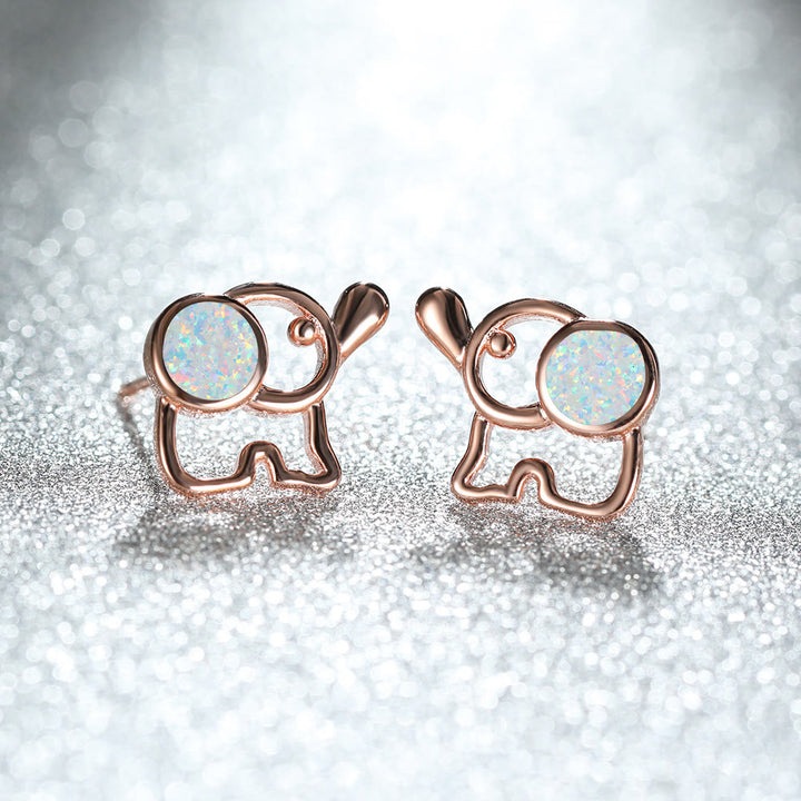 Boucles d'oreilles à tige en forme d'éléphant mignon avec opale bleu et blanc Olivenorma